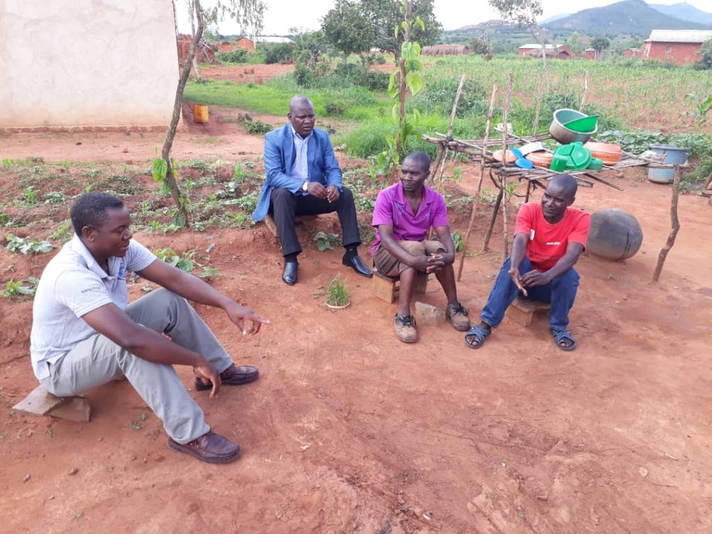 From left to right: Mr Vincent Shaba (Health Desk Officer), Father Edward Kamanga, Patrick Msukwa and TB Volunteer during a monitoring visit