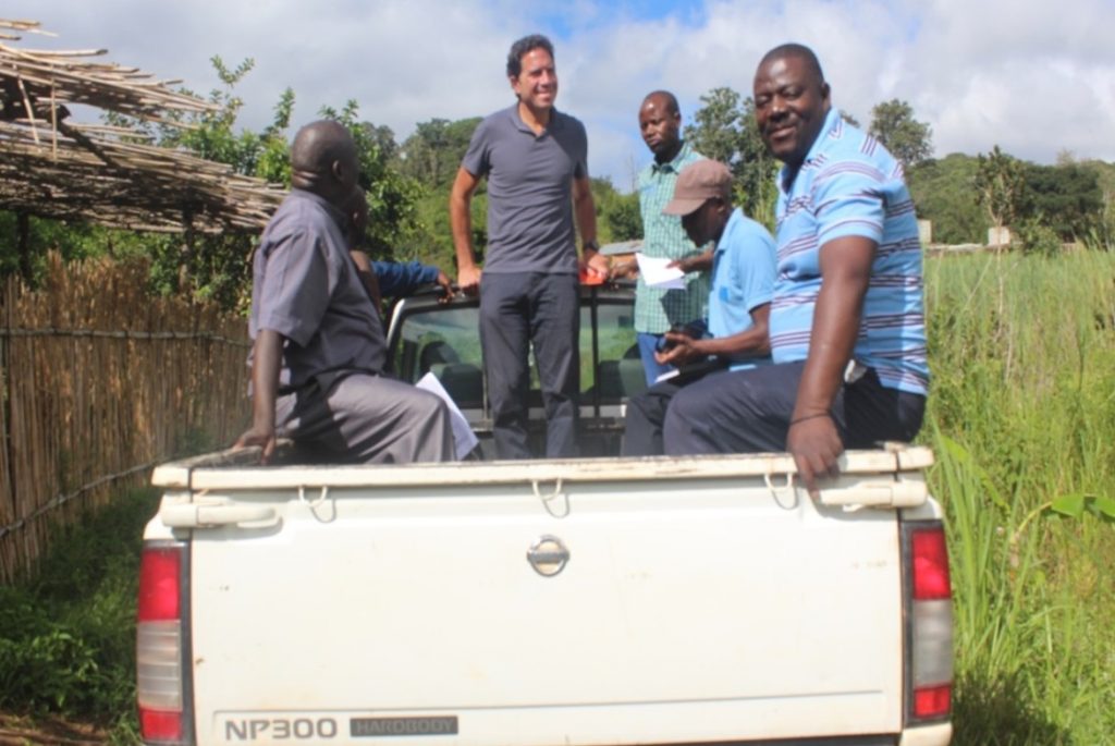 Keith and Fr Bundi were happy to be at the back of the vehicle enjoying the cool weather of Chipunga Farm