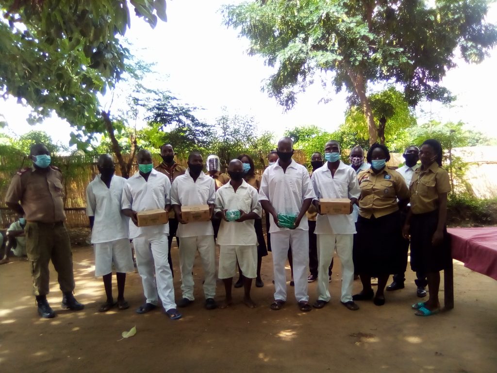 Scouts members with some of the inmates at Karonga Diocese
