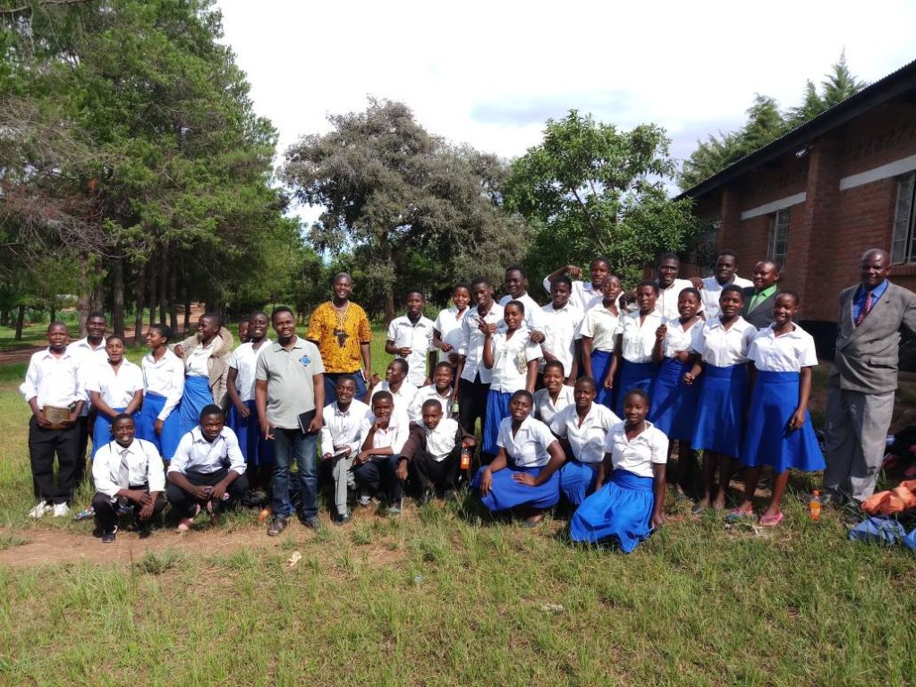 Members of the monitoring team with Chisenga CDSS My Health My Right Club members