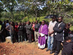 PIcture of Father Cyprian Ngoma (in purple chasuble) represented the Bishop at Khosolo where Ephraim was laid to rest