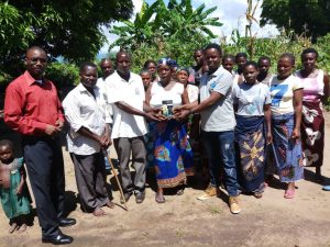 Picture of Ephraim Nyirenda (far right) with members of Radio Listening Club in Chilumba a day before he passed on