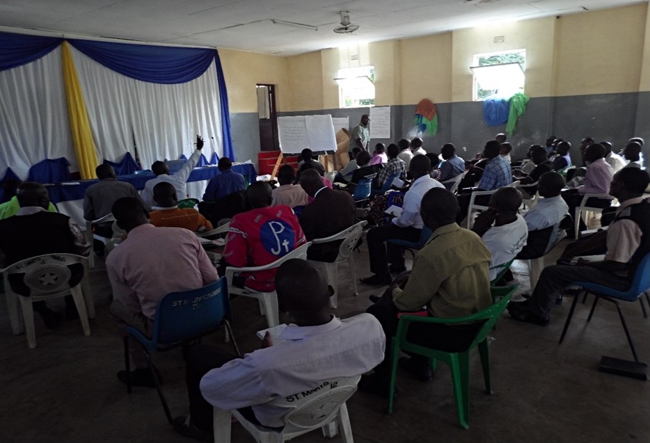 Picture of Fr. Joseph Sikwese, Pastoral Secretary of the Diocese, facilitating during the training at St Mary’s Parish 