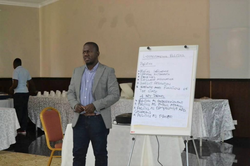 Justice and Peace Desk Officer, Louis Nkhata, facilitating during the workshop