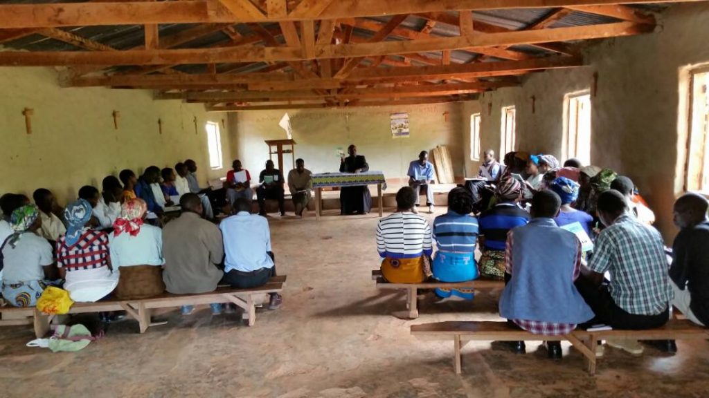 Father Silungwe giving instruction to Sunday school instructors from Mughese Zone 