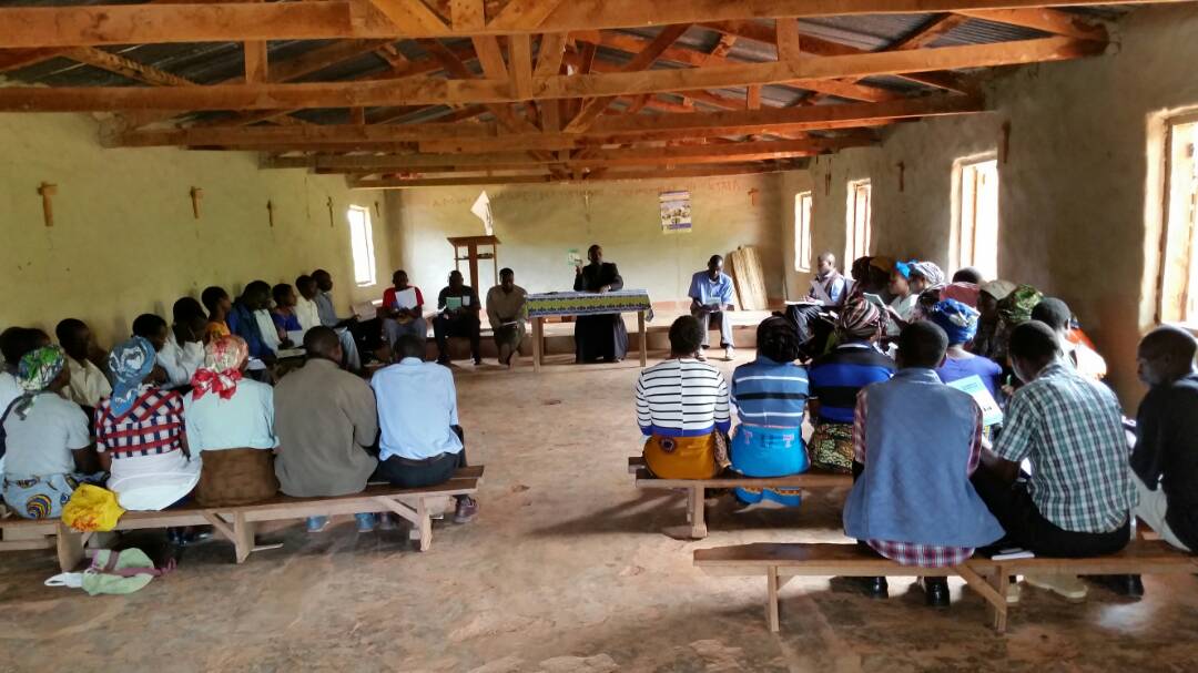 Father Silungwe giving instruction to Sunday school instructors from Mughese Zone