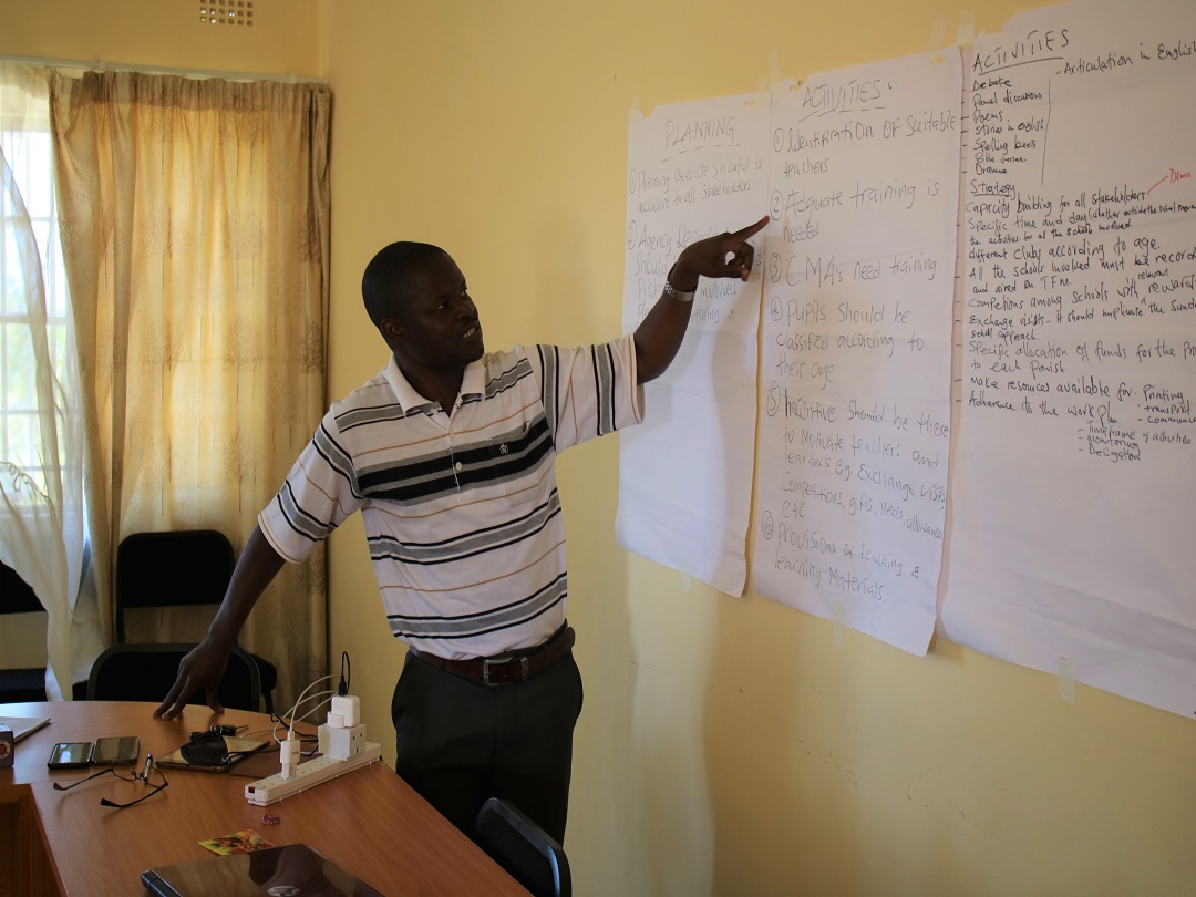 Father Mwanjabala making a presentation on behalf of priests