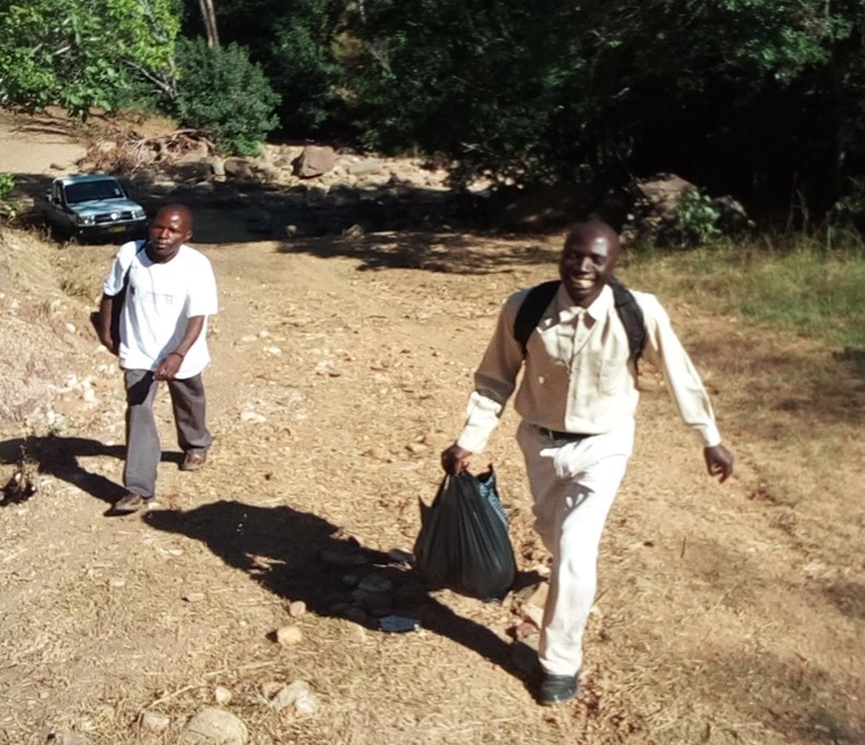 The walk to Juma begins, leaving the vehicle stuck in deep sand in one of the running streams