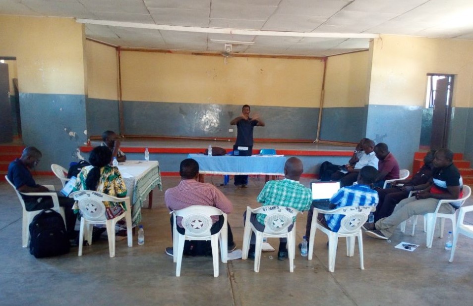 Moses Mwakisalu making a presentation