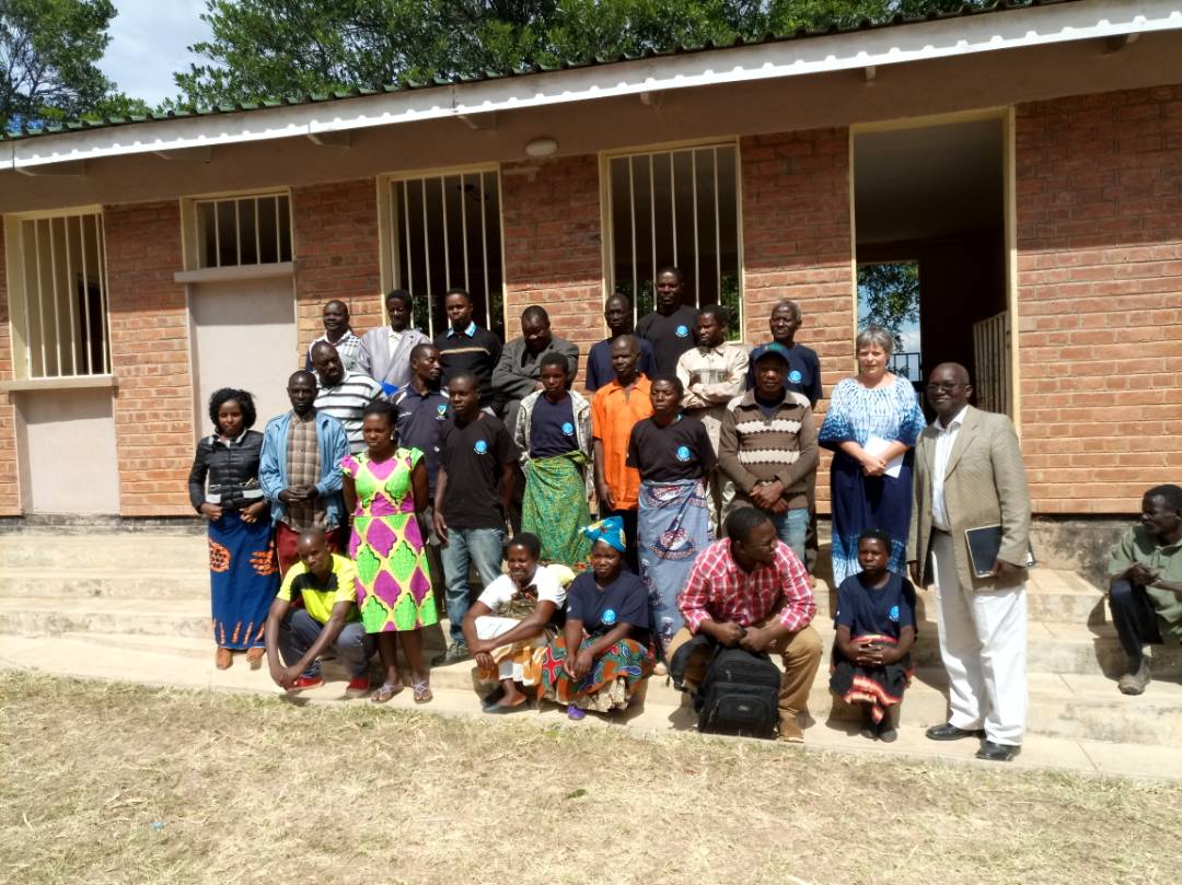 Ellen with CCJP volunteers and project beneficiaries