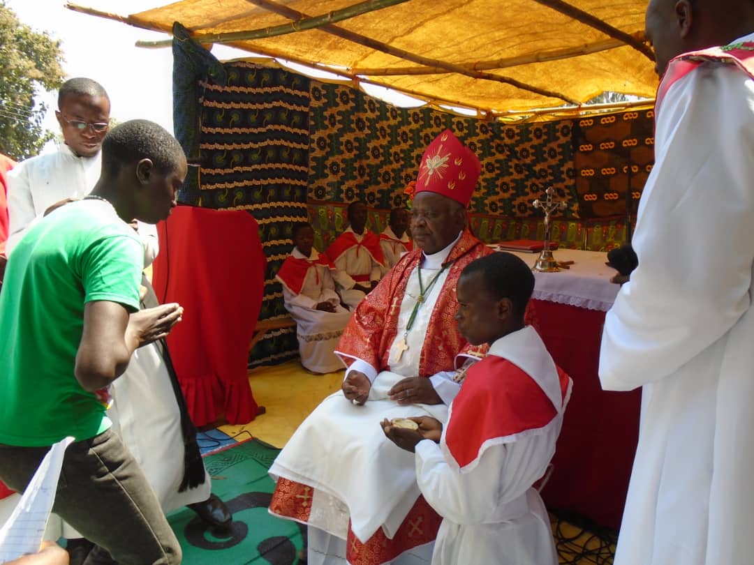 One of the candidates presenting himself before the Bishop to be confirmed