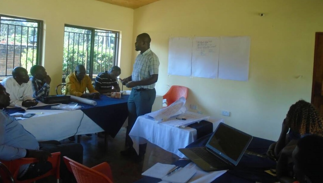 Caritas Secretary Mr Mwawi Shaba engaging participants during the training