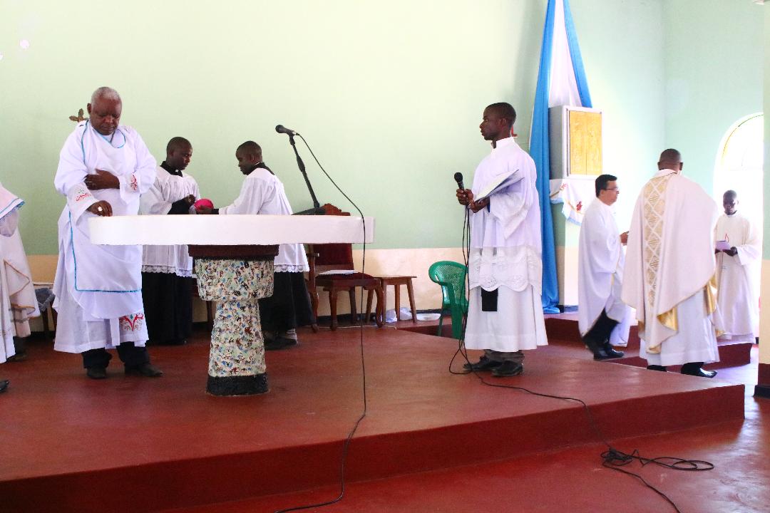 Bishop Mtumbuka consecrating the altar with Holy Oils