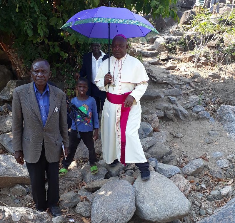 The Bishop walking to the venue of the Mass