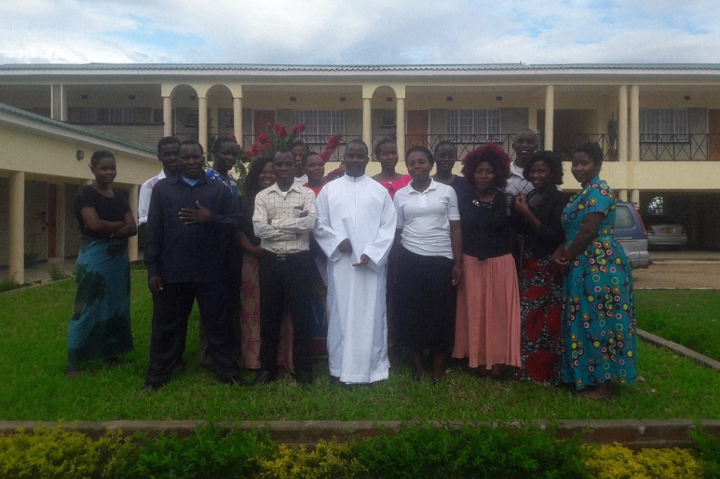 TFM Staff members with Father Silungwe after the recollection
