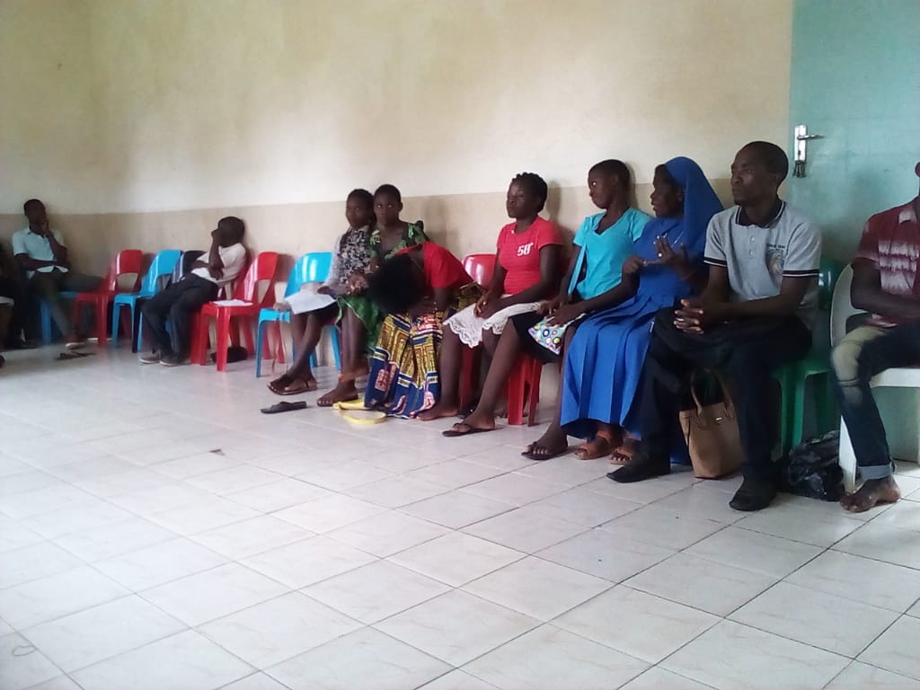 Sr Beatrice Chipeta (in blue habit) stressing a point during the meeting