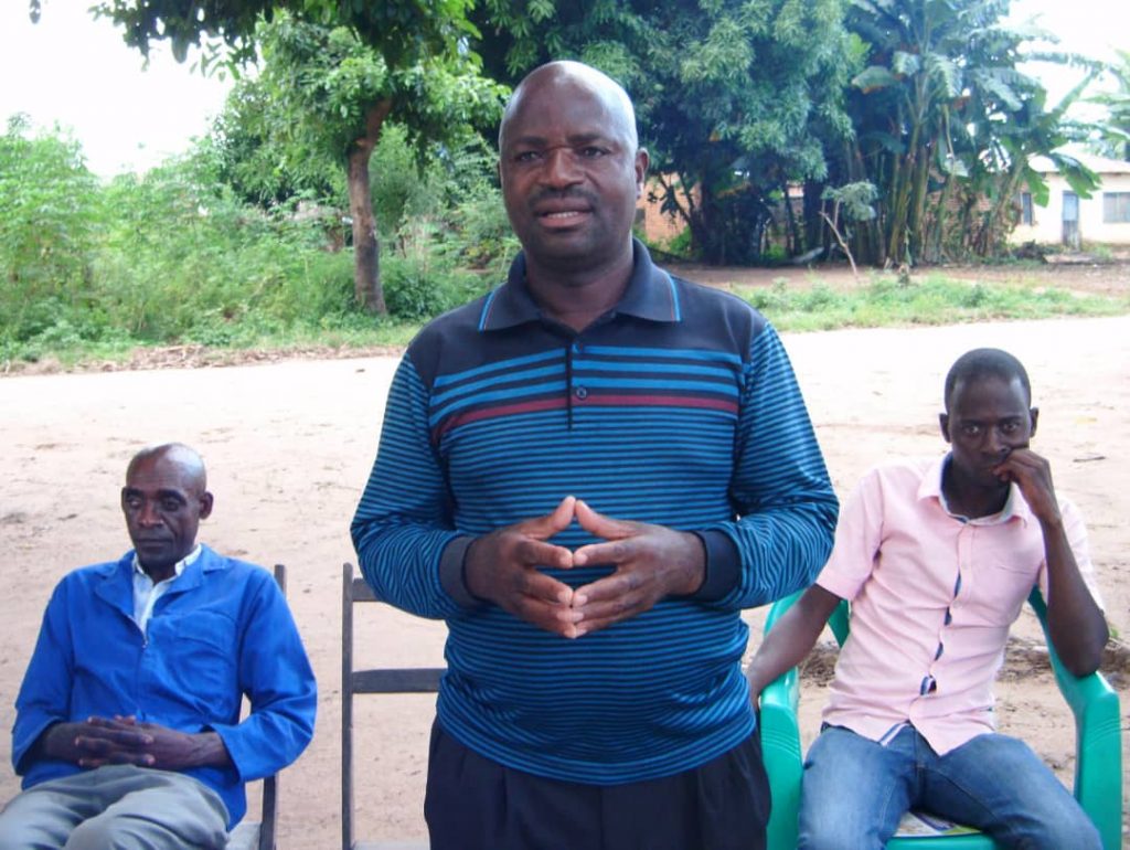 A representative of a mining company making commitments during the meeting