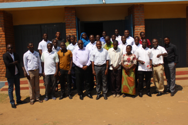 Missionaries with Monsignor Chitete (5th from left) and Fr Mwakhwawa (6th) during the reporting session