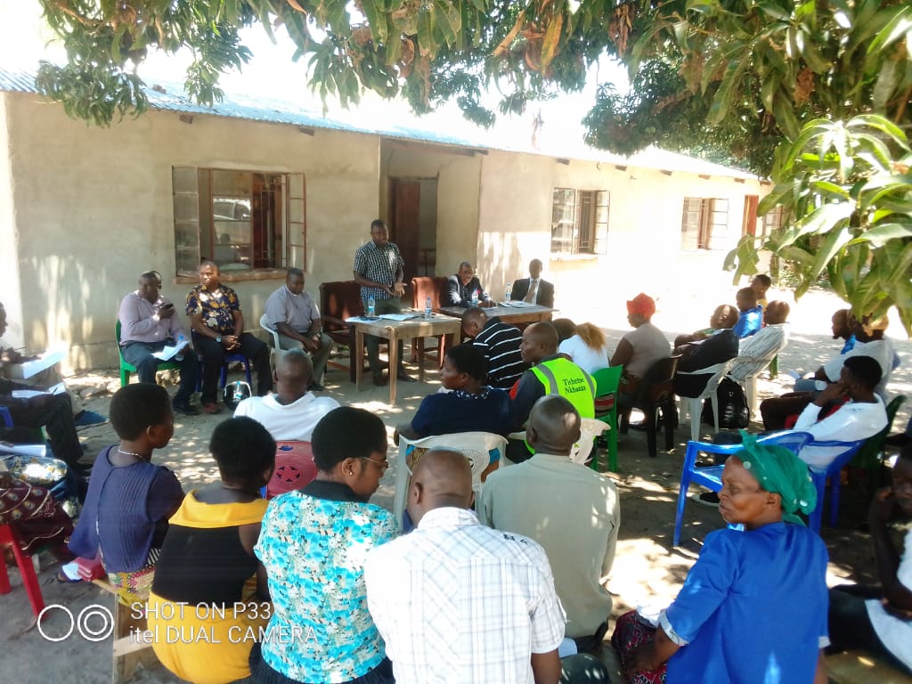 Father Bulambo (in clerical attire) and a cross section of participants