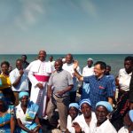 Bishop Mtumbuka with CICM fathers and Christians