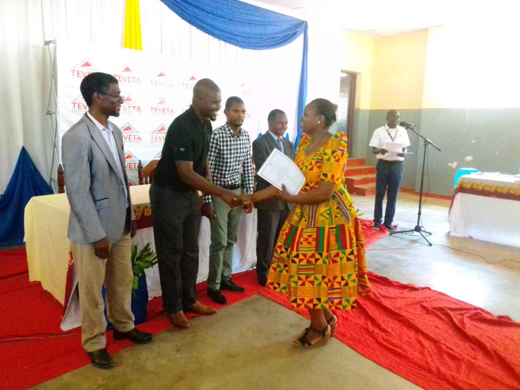 One of the participants receiving her certificate
