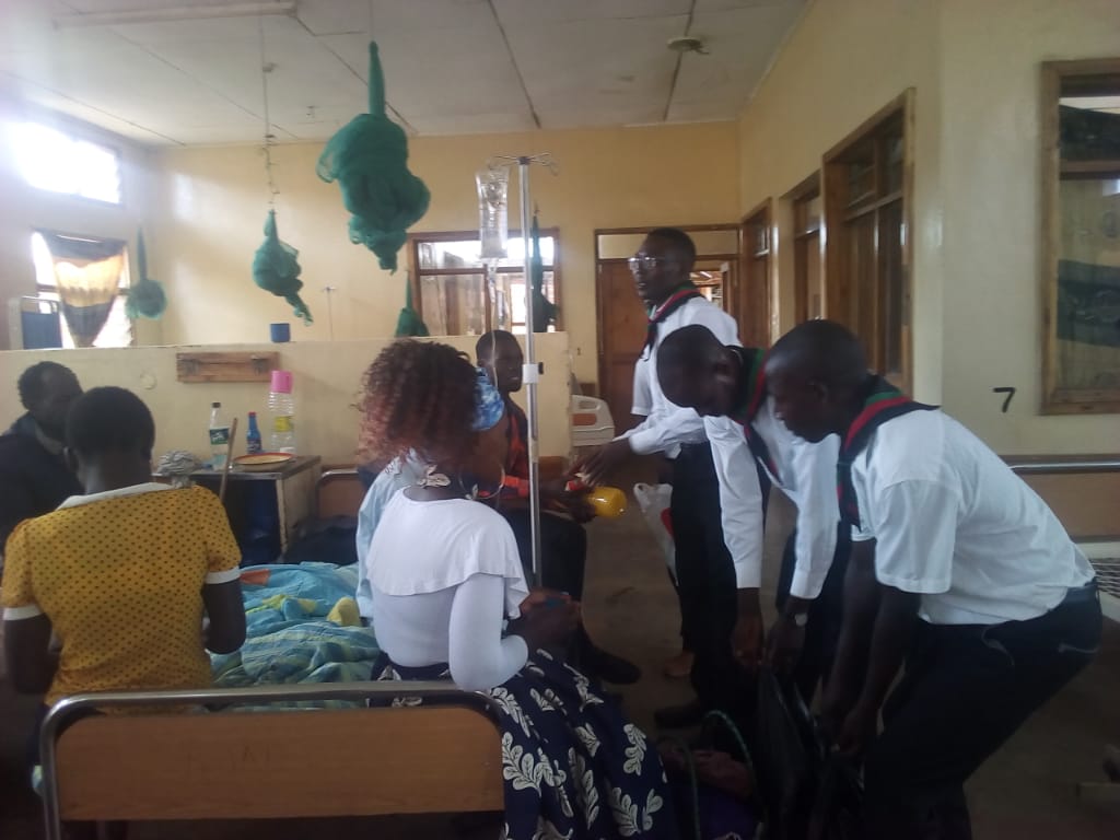 Catholic Scouts Cheer Sick at Chitipa District Hospital