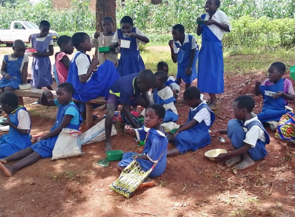 Girls enjoying their porridge