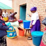 Faithful wash hands before & after Sunday Liturgy at Chibanji Prayer Centre