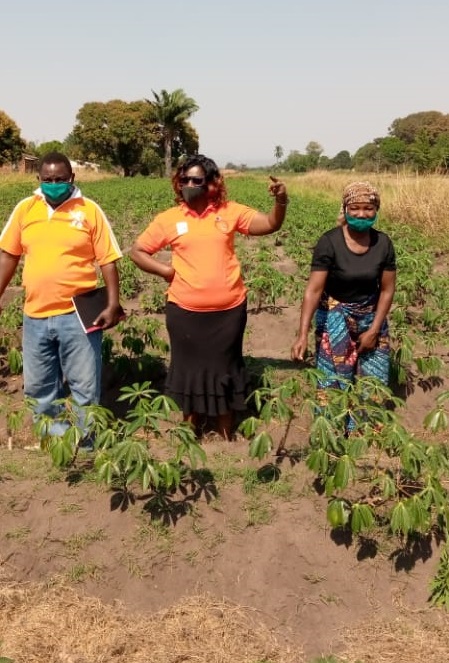 Prosperina Shaba with Simkonda Family in their cassava garden